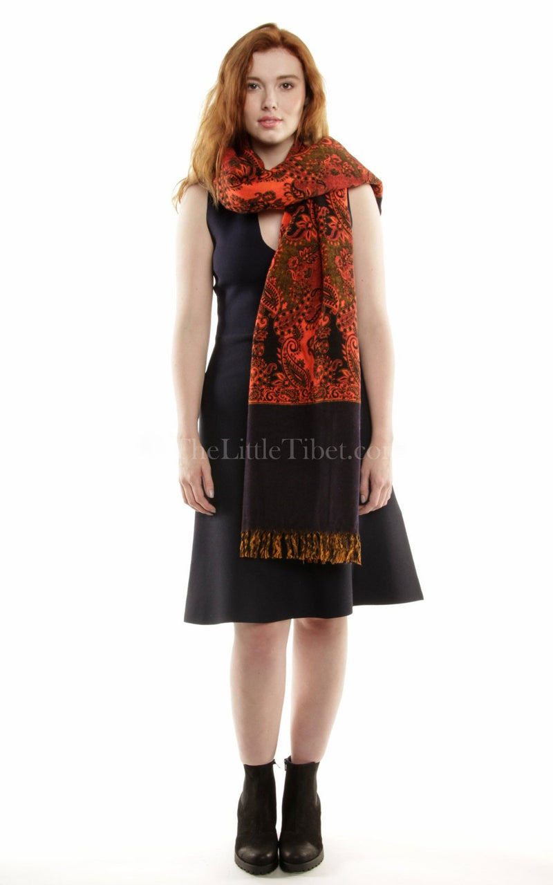 Burnt orange  paisley design reversible himalayan tibet wool shawl styled around neck