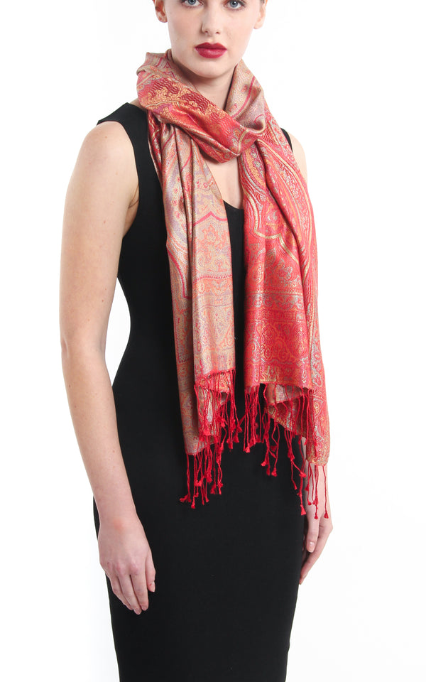 Luxurious cherry red reversible  Pure Silk Pashmina with Paisley pattern styled around the shoulders