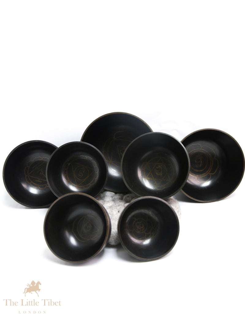 Serenity with the Nestling Seven Chakra Dark Tibetan Singing Bowl Set- 7 Chakra Nestling Dark