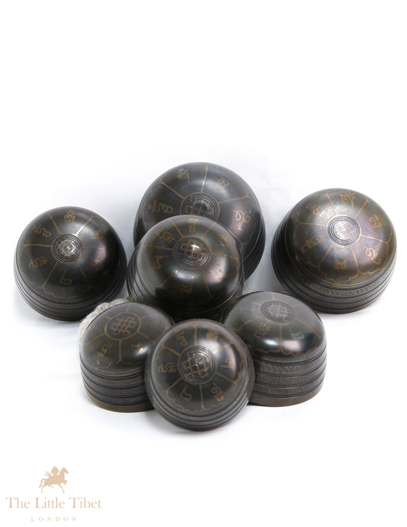 Serenity with the Nestling Seven Chakra Dark Tibetan Singing Bowl Set- 7 Chakra Nestling Dark