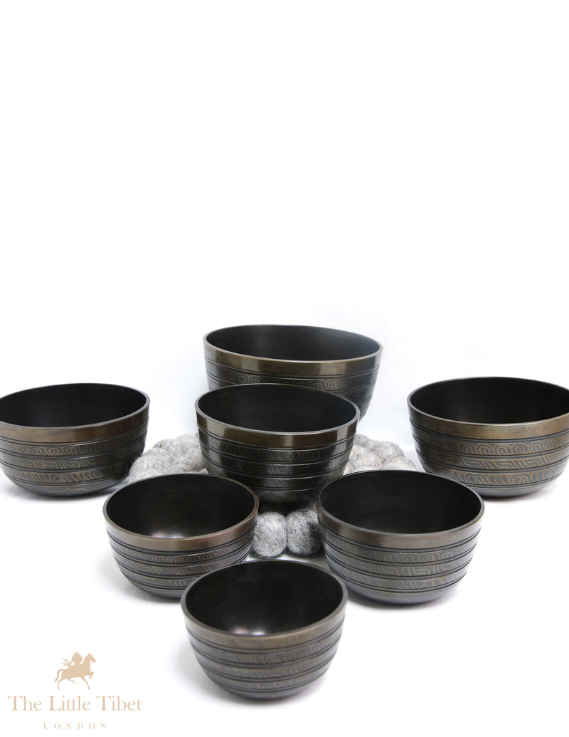 Serenity with the Nestling Seven Chakra Dark Tibetan Singing Bowl Set- 7 Chakra Nestling Dark