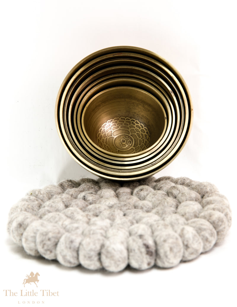Peace and Tranquility with the Nestling Seven Chakra Golden Tibetan Singing Bowl Set- 7 Chakra Nestling Golden
