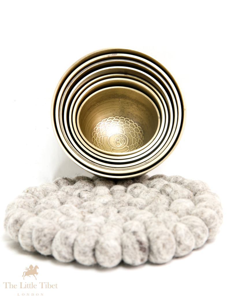Peace and Tranquility with the Nestling Seven Chakra Golden Tibetan Singing Bowl Set- 7 Chakra Nestling Golden