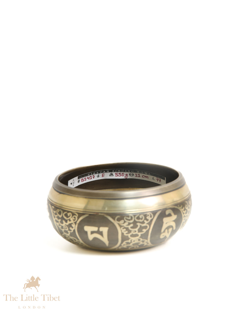 Harmonizing Vibrations: The Significance of "Om" on Tibetan Singing Bowls - BZ417