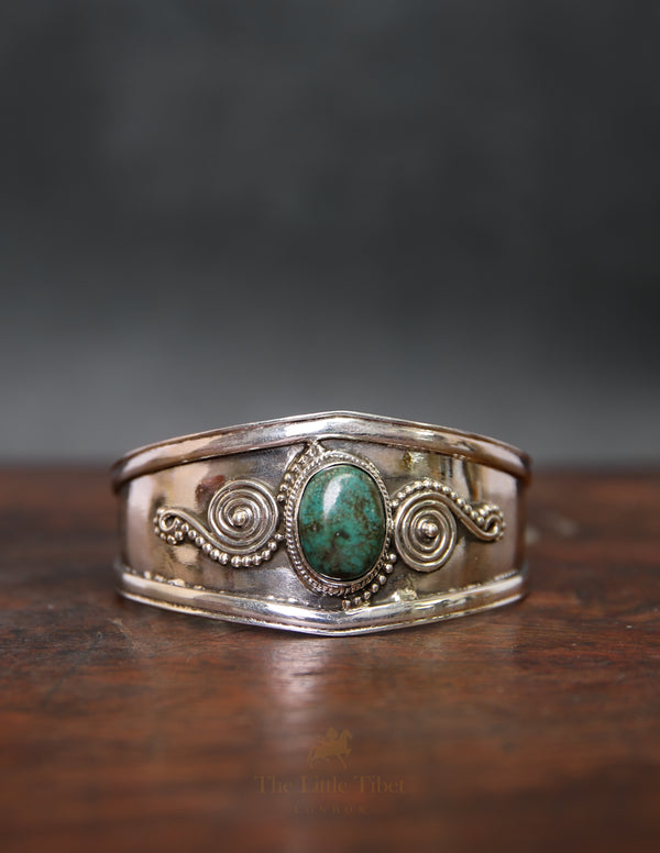 Chunky Tibetan Turquoise Bangle – Large Central Stone with Intricate Silver Design