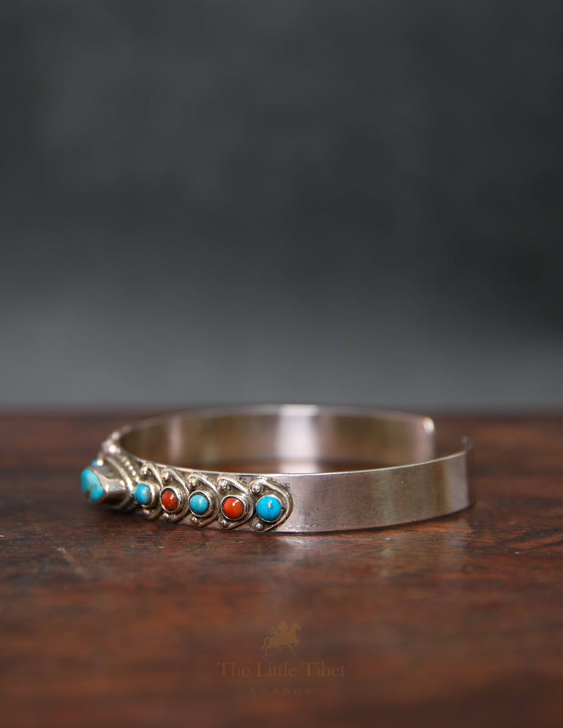 Tibetan Silver Bangle with Coral & Turquoise – Alternating Gemstones with Central Elongated Turquoise
