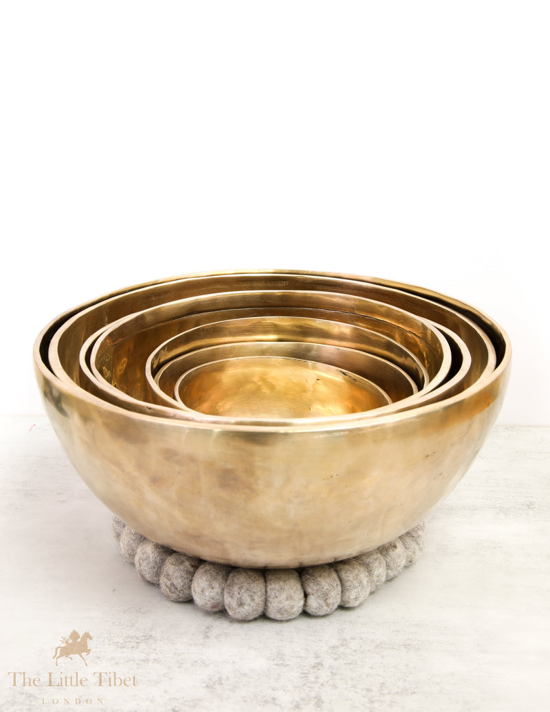 Discover Balance and Harmony with the Nestling Seven Chakra Tibetan Singing Bowl Set- Plain 7 Chakra Set