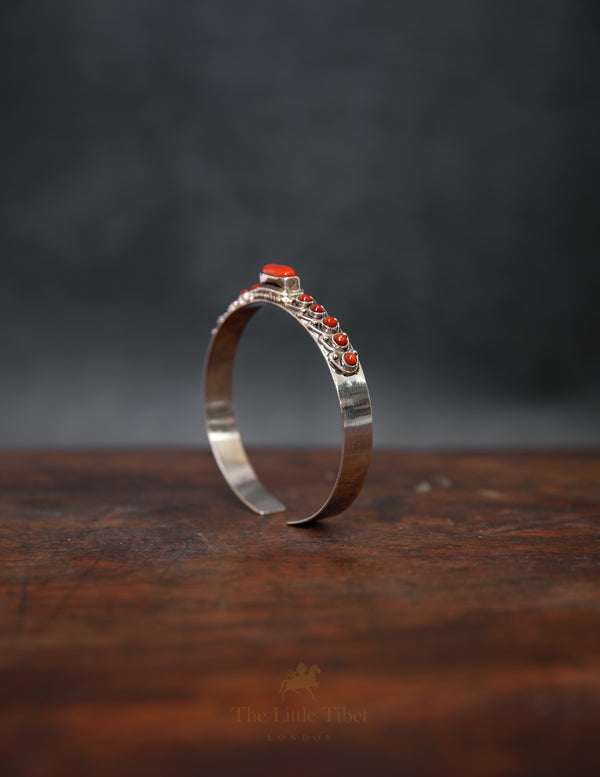 Tibetan Red Coral Bangle – Adjustable Slim Silver Bracelet with Central Elongated Stud
