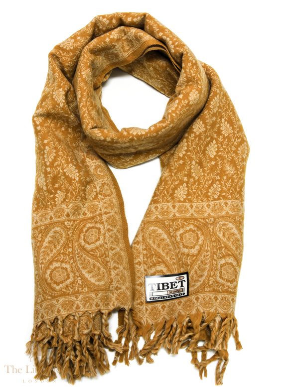 Golden Elegance: The Timeless Tibet Shawl