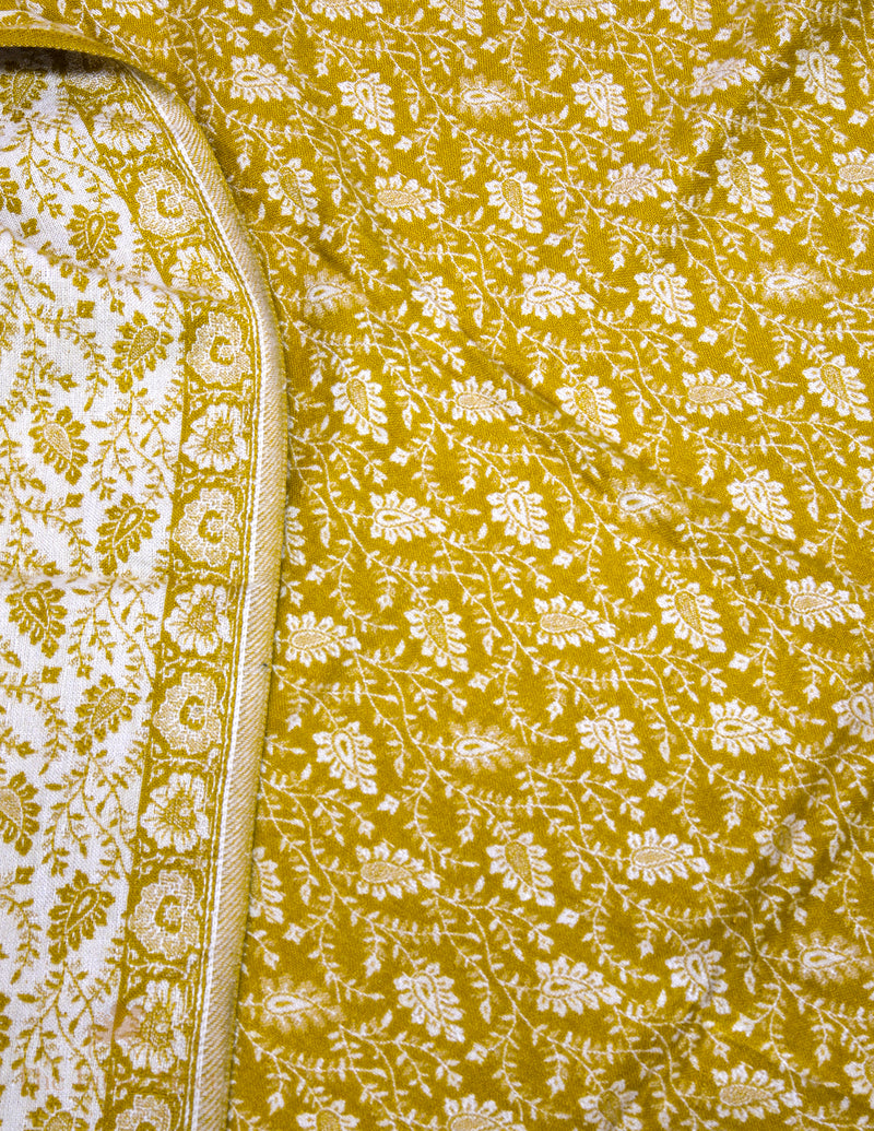 Golden Elegance: The Timeless Tibet Shawl