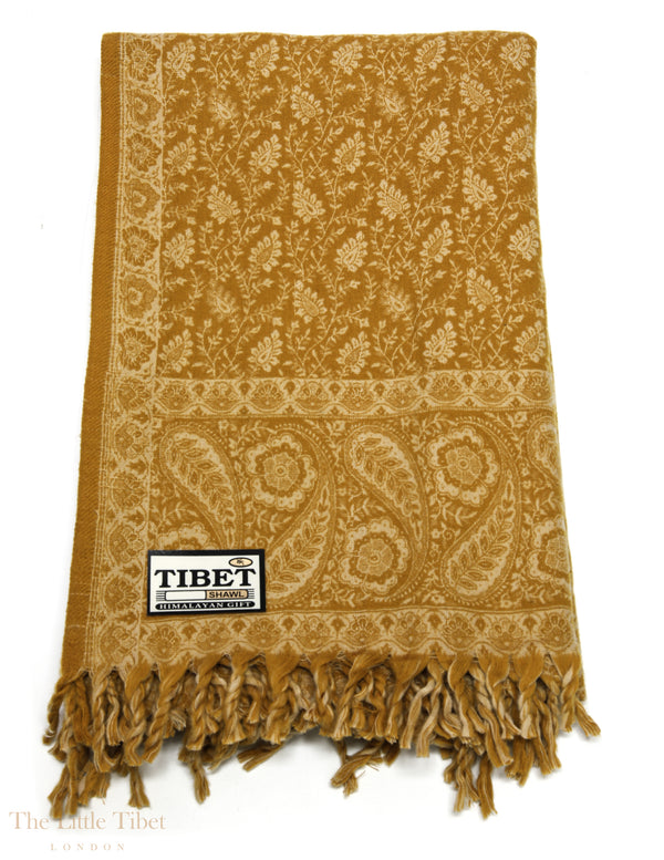 Golden Elegance: The Timeless Tibet Shawl