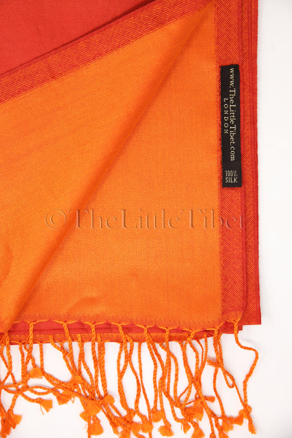 two toned reversible red orange silk scarf with tassels