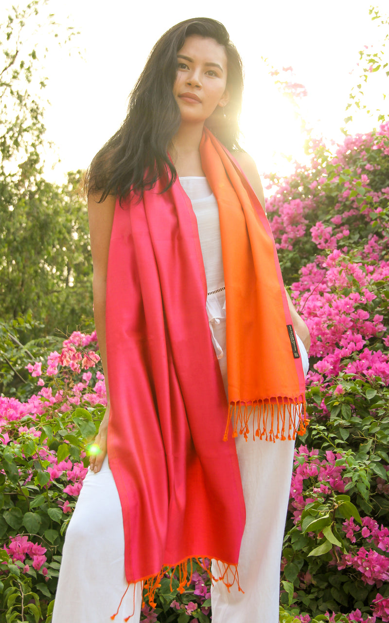 model wearing Luxury 100% pure silk fuschia bright orange  reversible pink silk scarf pashmina 