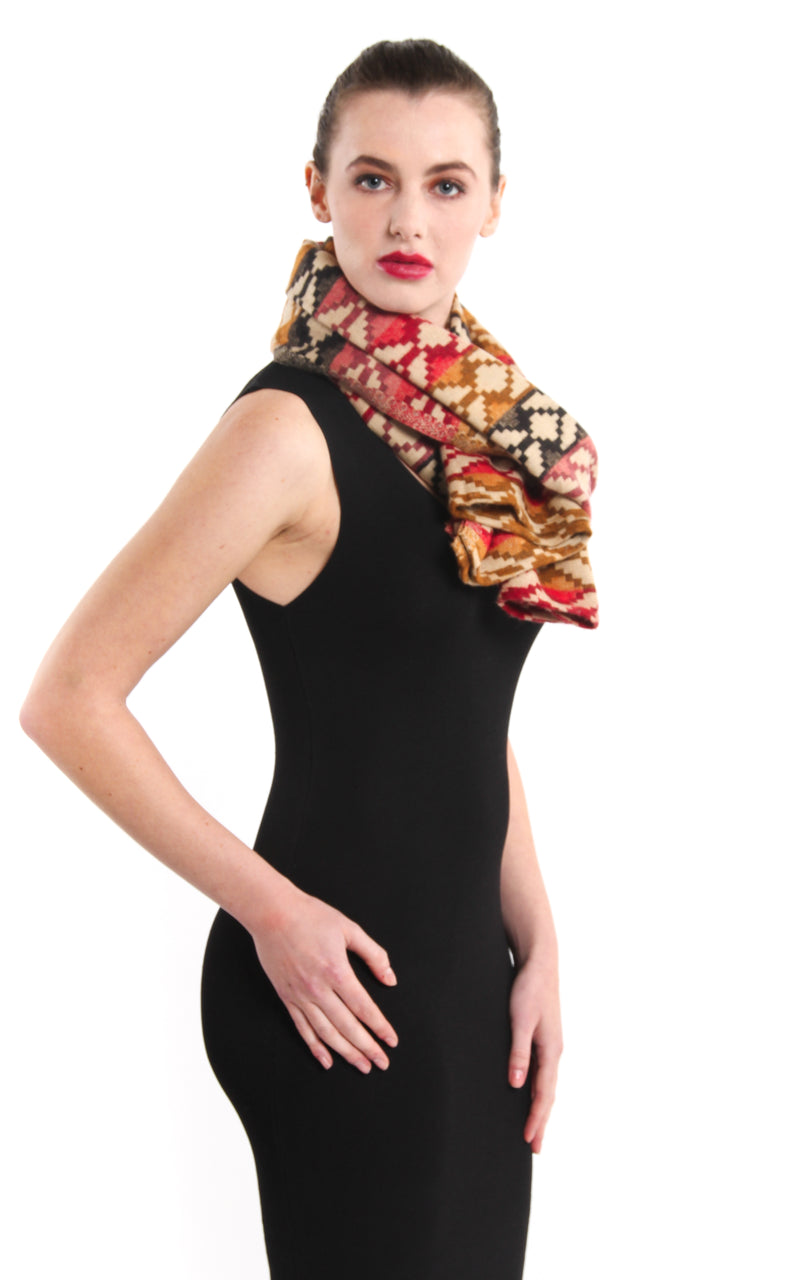 Model wearing Geometric snowflake pattern tibet shawl styled around neck