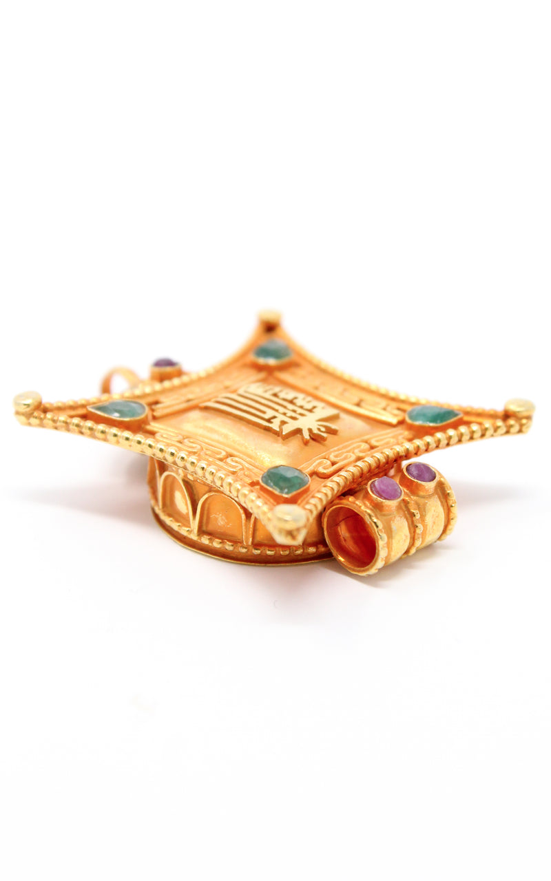 Gold Kalachakra Wheel of Time Locket Pendant ruby emerald accents close up