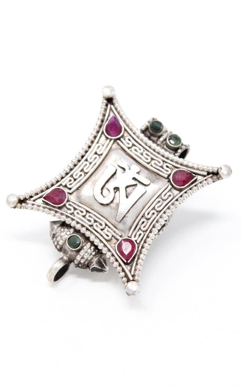 Silver Om Locket Pendant emerald ruby beads handmade tibetan jewellery exterior close up