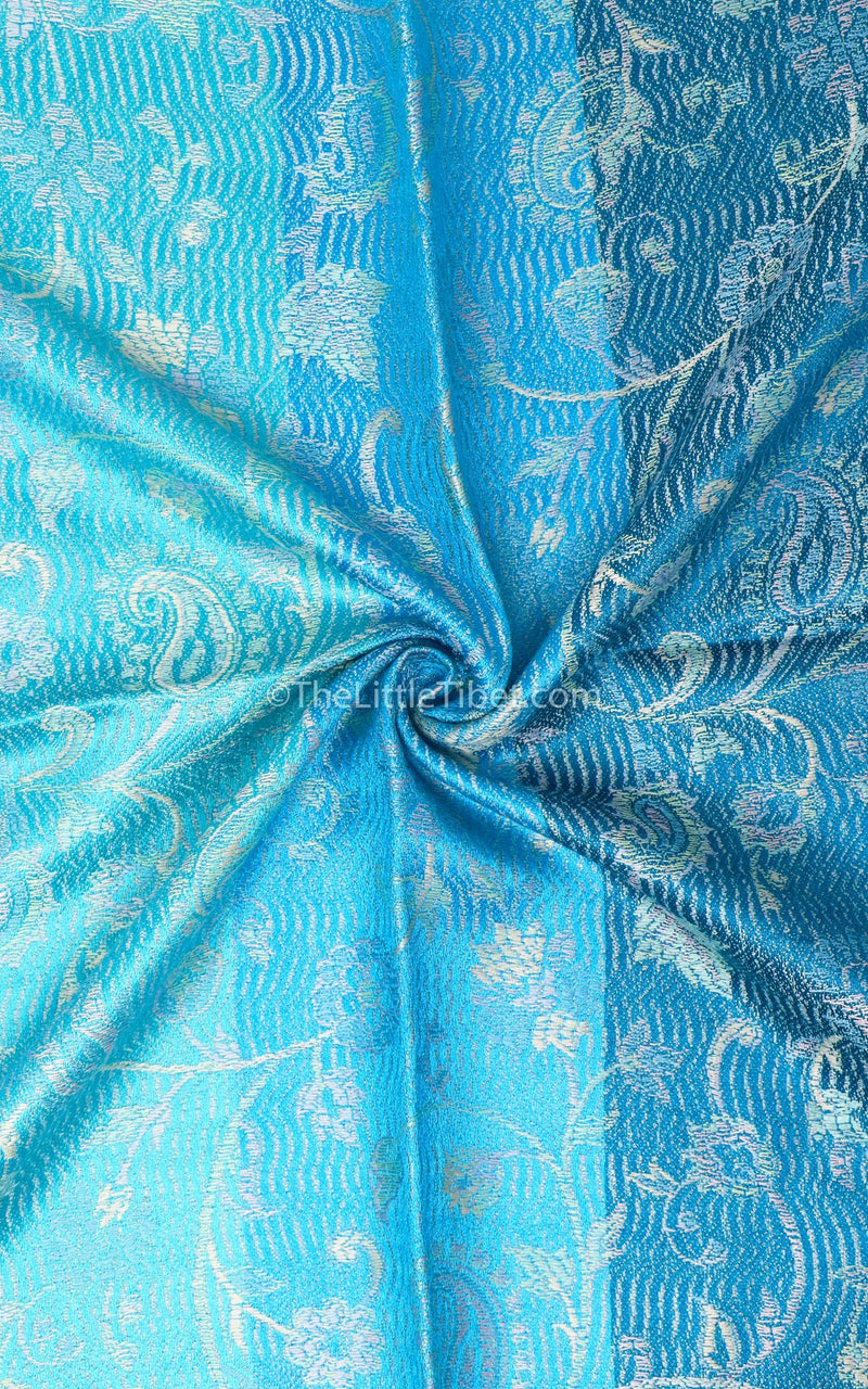 Close up of the Aqua Sea Blue Pure Silk Pashmina with silver paisley accents