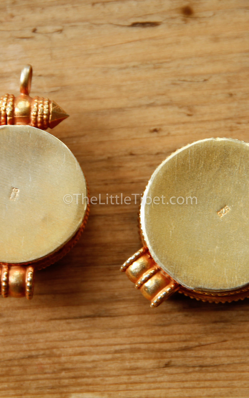 circular Gold Plated Endless Knot auspicious symbol Locket back ruby emerald stones