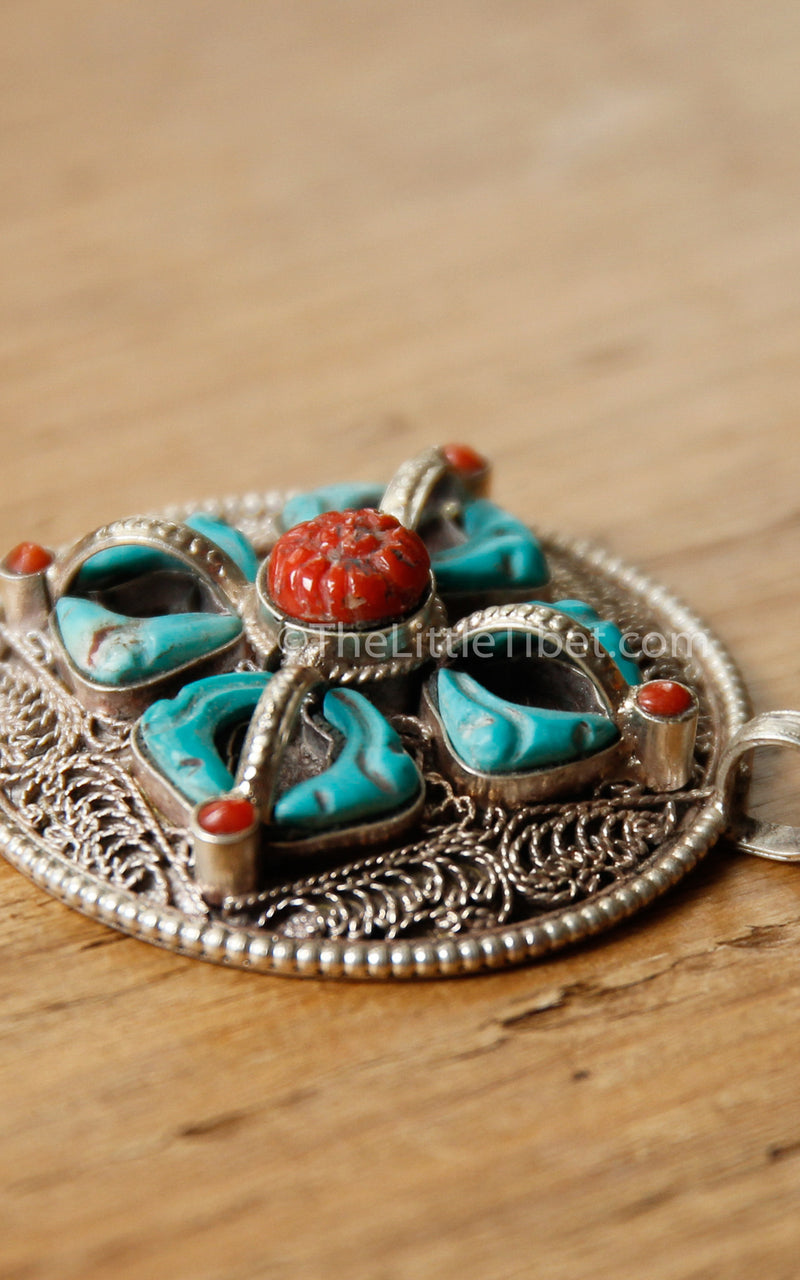 double dorjee turquoise coral thunderbolt pendant handmade tibetan jewellery  sideview