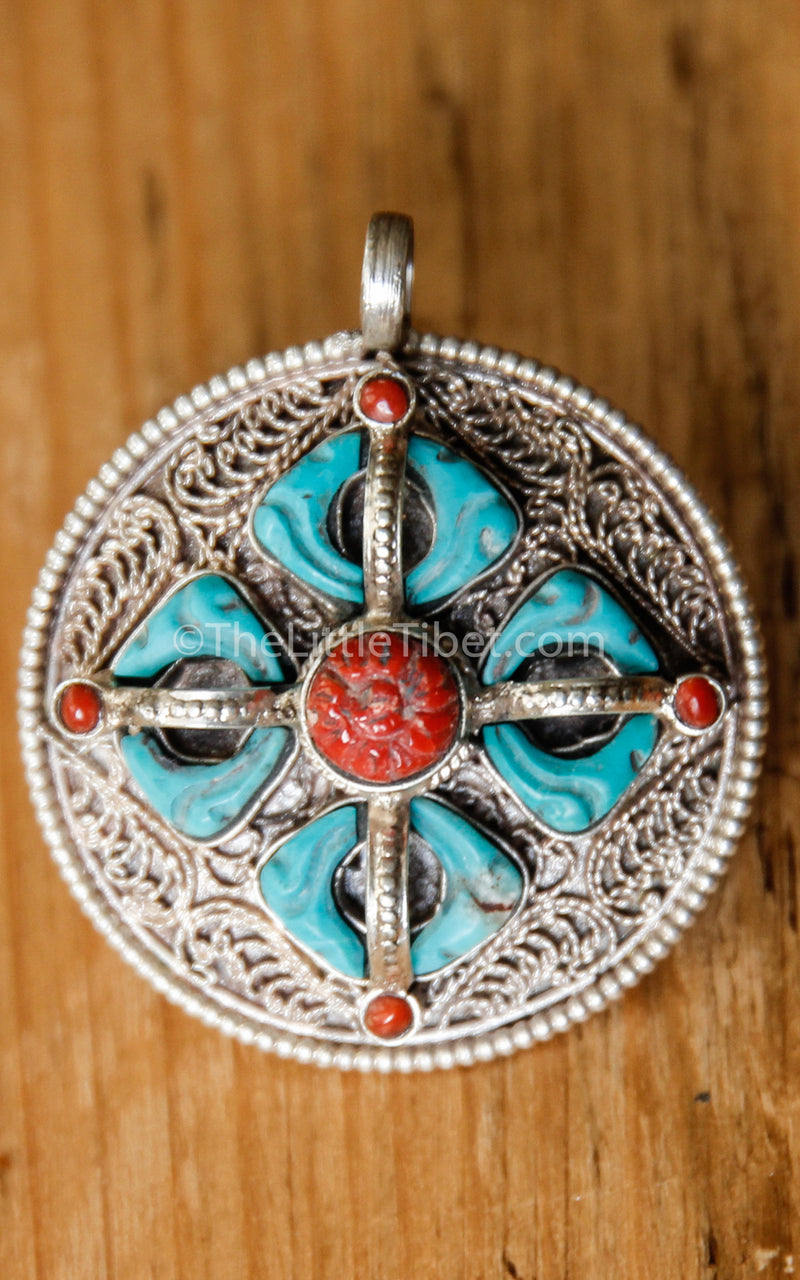 double dorjee turquoise coral thunderbolt pendant handmade tibetan jewellery  close up