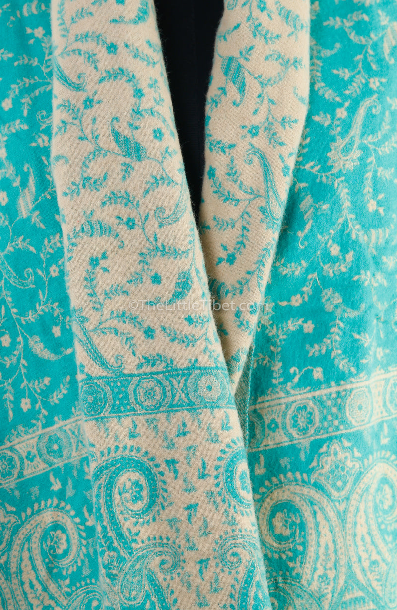 close up Aqua blue cream paisley design tibet shawl chunky knit