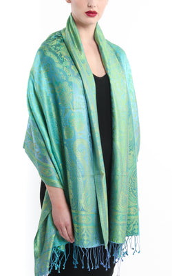  luxurious mint green and blue  paisley designed elegant silk pashmina with tassels draped around shoulders