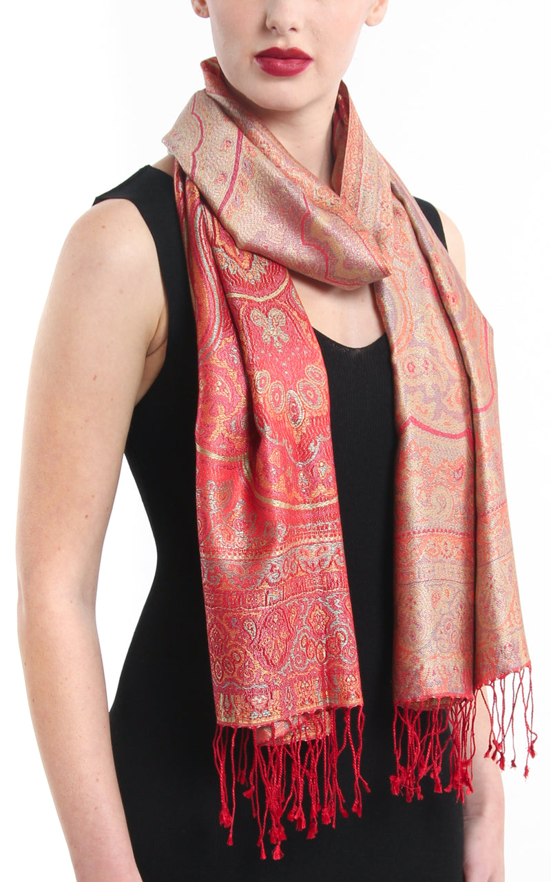 Luxurious cherry red reversible  Pure Silk Pashmina with Paisley pattern styled around the neck 