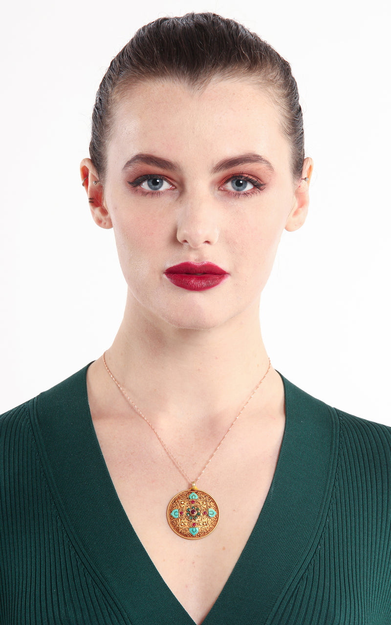 model wearing Circular Unique Gold Mandala Pendant Tibetan handmade jewellery 