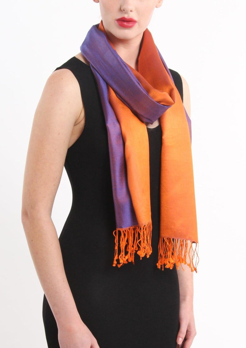 model wearing reversible orange purple silk scarf worn on the neck 100% pure silk